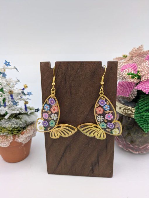 boucle d'oreille papillon fleuri 